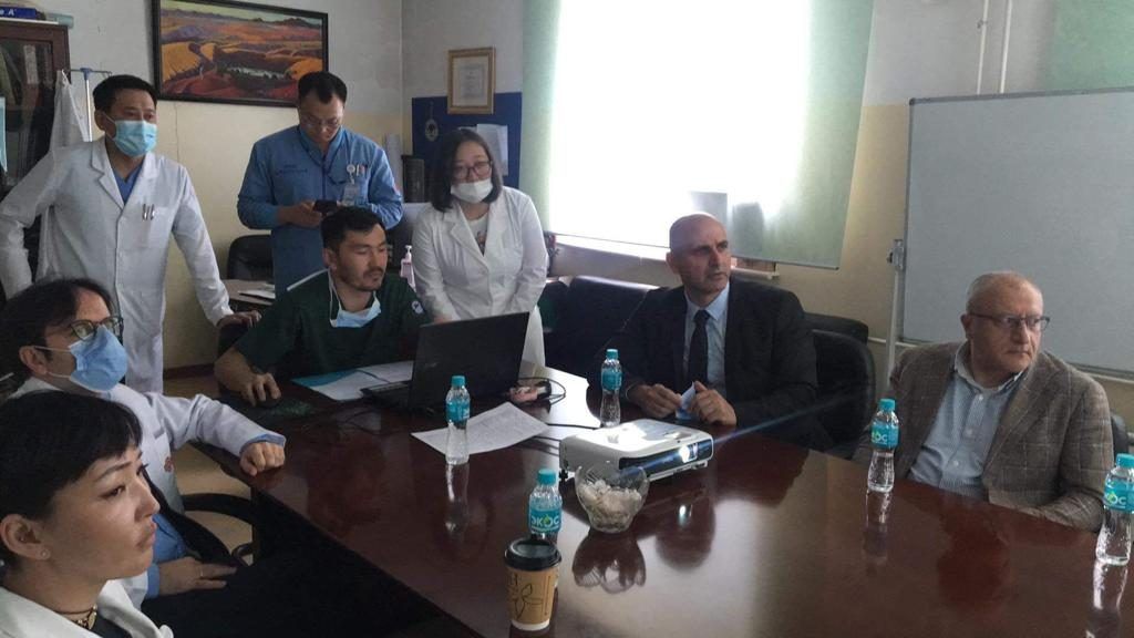 Turkish and Mongolian clinicians review cases together. Ulaanbaatar, May 2022.